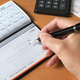 Illustration for article titled Do You Still Write Checks?